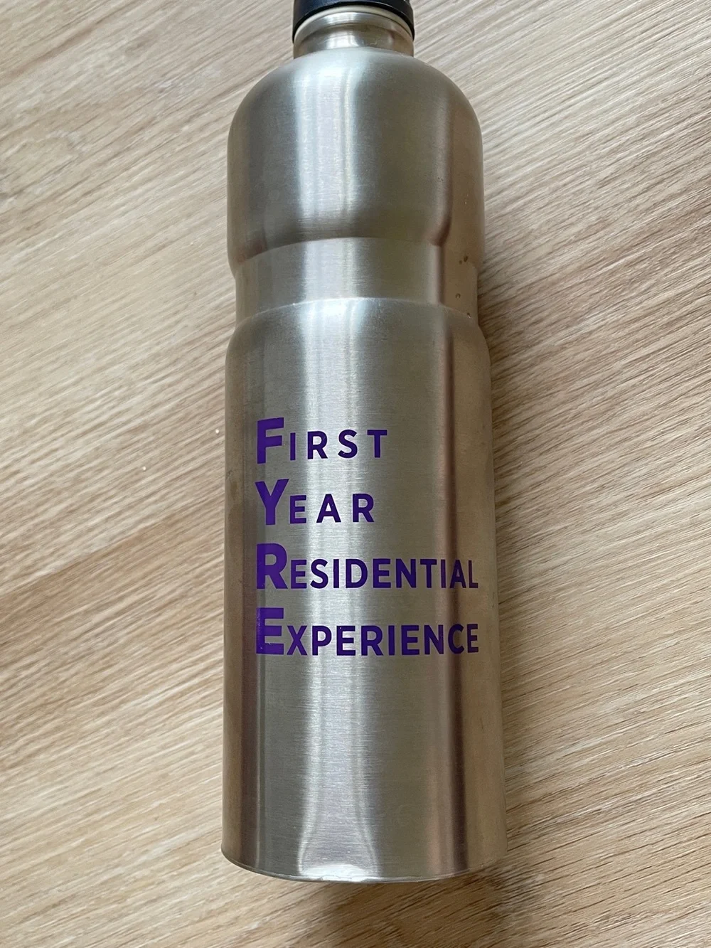 Stainless Steel Silver Water Bottle with Purple Logo